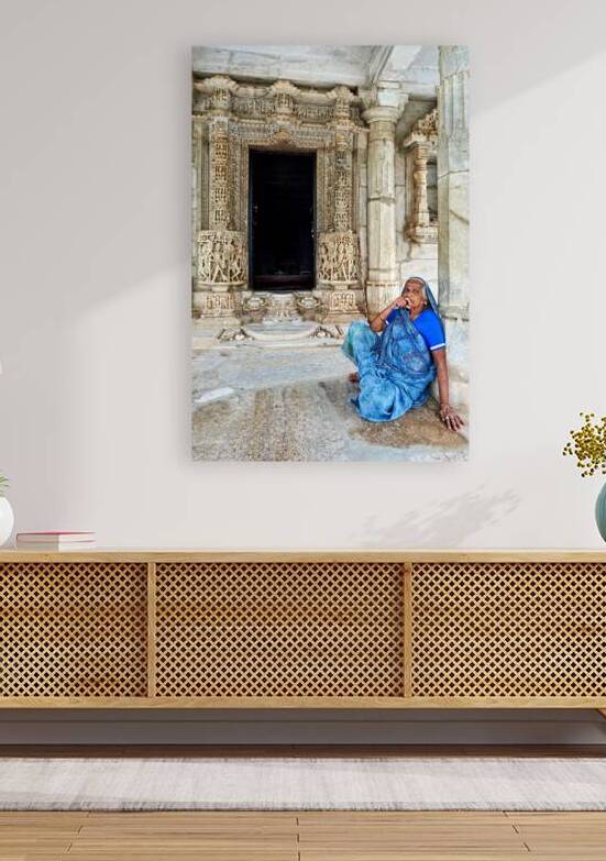 Old Jain temples in Ranakpur Rajasthan with a woman resting by Marco Brivio