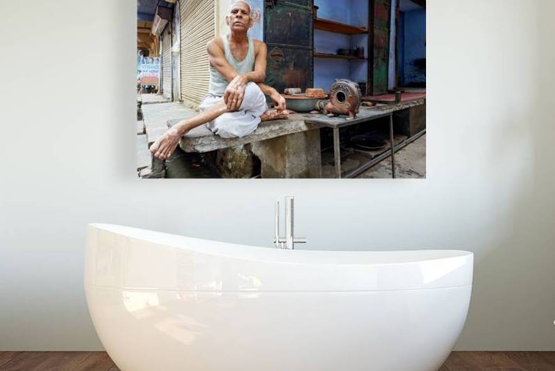 Portrait of an old man sitting outside a shop in Bundi Rajastha by Marco Brivio