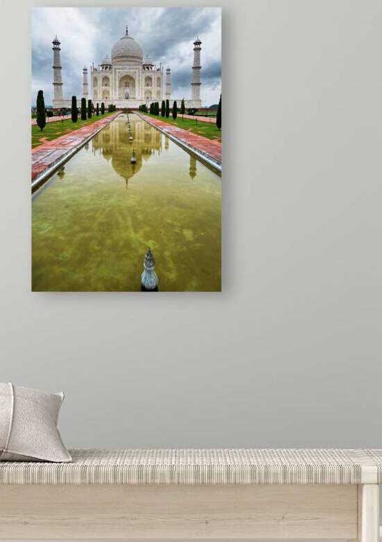 Explore the Taj Mahal Palace in Agra India during cloudy weather by Marco Brivio