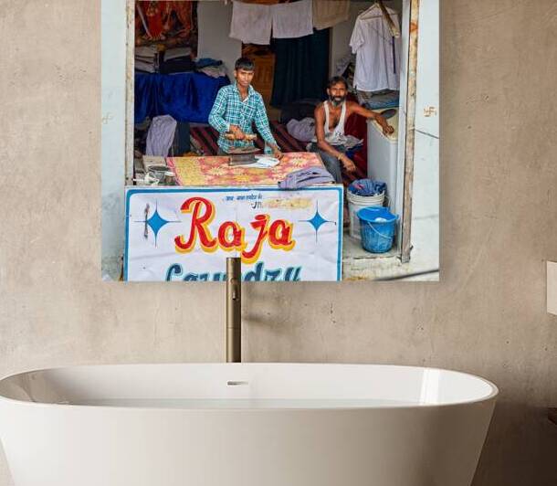 Ironing clothes in Bundi Rajasthan during the day by Marco Brivio