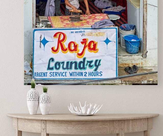 Ironing clothes at Raja Laundry in Bundi Rajasthan by Marco Brivio