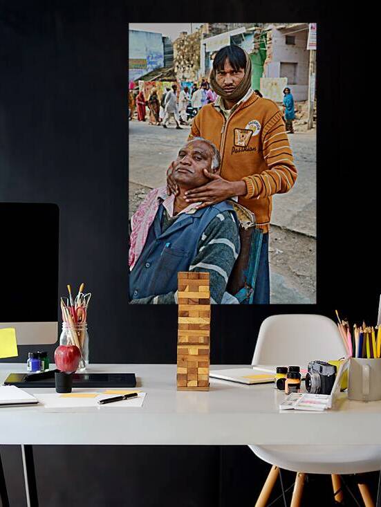 Barber serves customer on street in Orchha Madhya Pradesh Indi by Marco Brivio