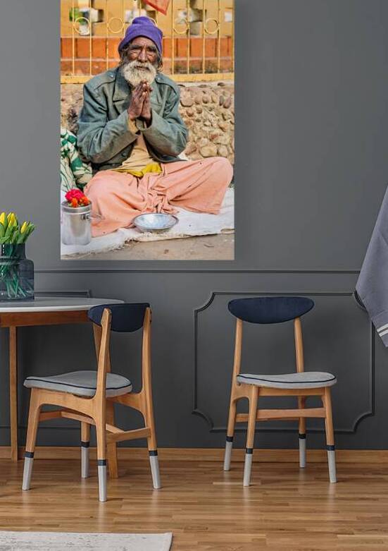 Man in Orchha engages in prayer by a busy road by Marco Brivio