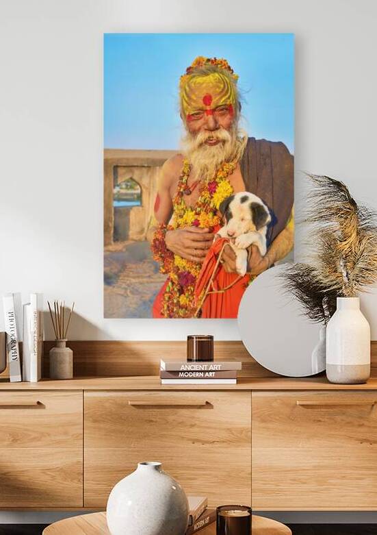 Holy man with puppy in Orchha Madhya Pradesh India by Marco Brivio