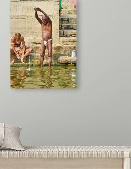 Sacred ablutions at the Ganges river in Varanasi Uttar Pradesh by Marco Brivio