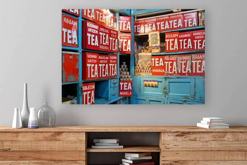 Varanasi tea stall with various tea types and colorful boxes by Marco Brivio