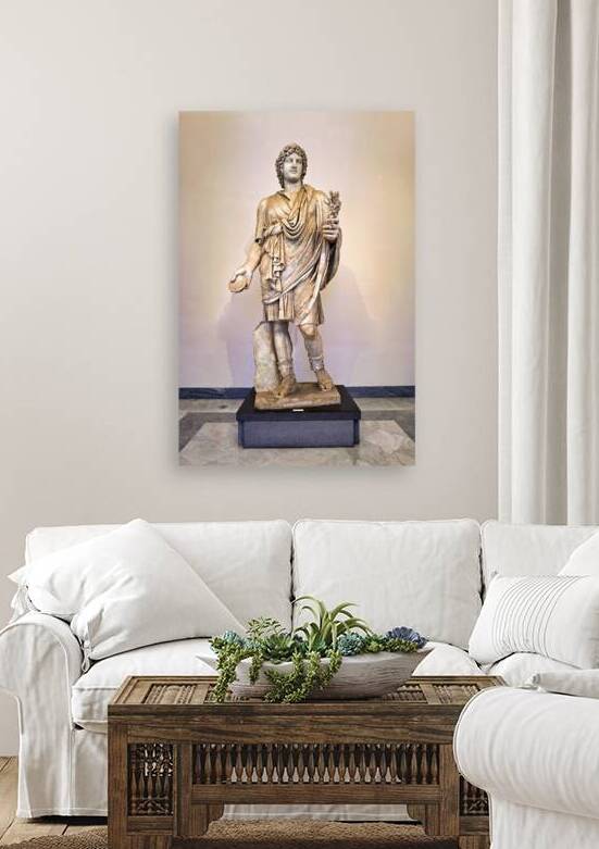 A Roman statue stands in the National Archaeological Museum of N by Marco Brivio