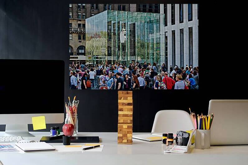 Many people visit the Apple Store at 5th Avenue in Manhattan by Marco Brivio