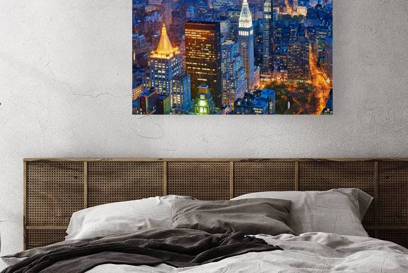 Manhattan skyline view at dusk from above in New York City by Marco Brivio