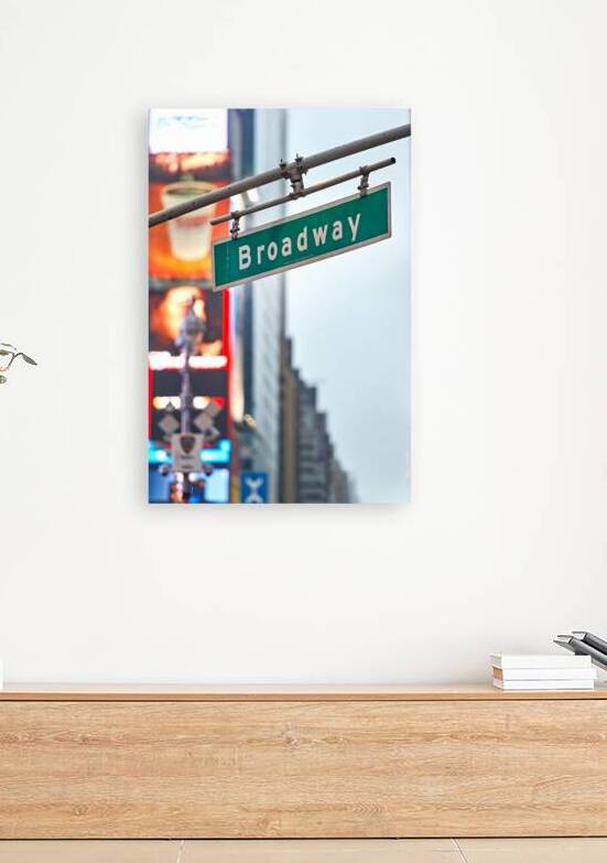 Broadway street sign in Manhattan New York City during the day by Marco Brivio