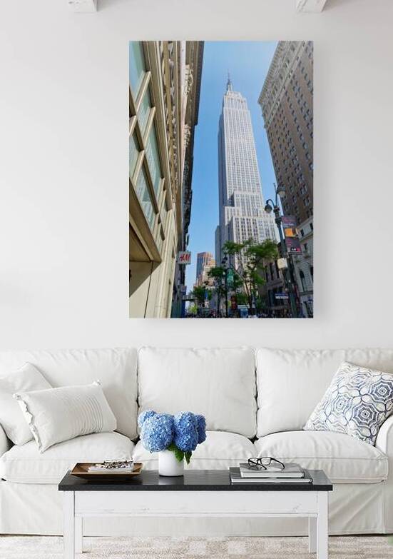 Visit Empire State Building in Manhattan New York during daytim by Marco Brivio