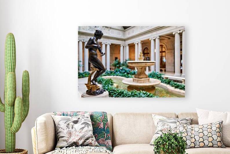 Sculpture near fountain in courtyard at Frick Collection in Manh by Marco Brivio