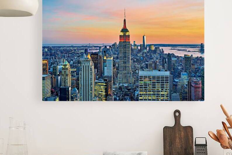 Aerial view of Empire State Building at sunset in New York City by Marco Brivio