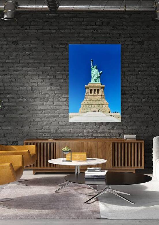 Statue of Liberty stands proudly on Liberty Island in Manhattan by Marco Brivio