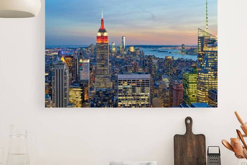 Manhattan aerial view showing Empire State Building at sunset by Marco Brivio