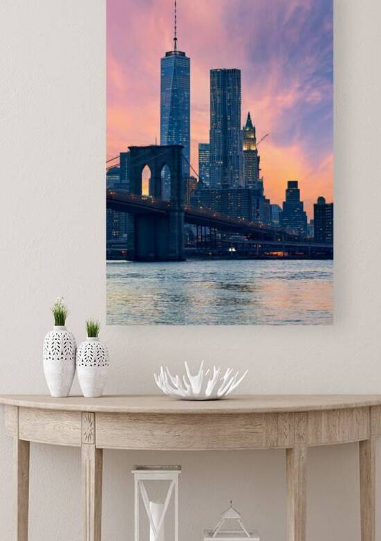 Brooklyn Bridge and Manhattan skyline during sunset in New York by Marco Brivio