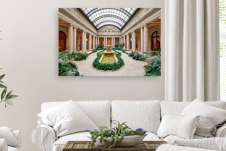 People walk around the courtyard at the Frick Collection in New  by Marco Brivio