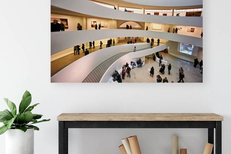 People walk through the spiraled structure of Solomon R by Marco Brivio