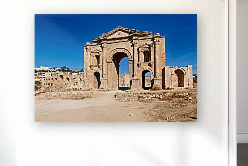 Greco Roman ruins in Gerasa Jerash Jordan under clear blue sky by Marco Brivio