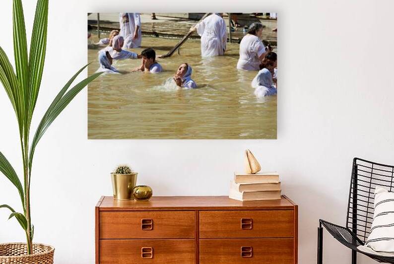 Visitors participate in baptism ceremonies at the Jordan River by Marco Brivio