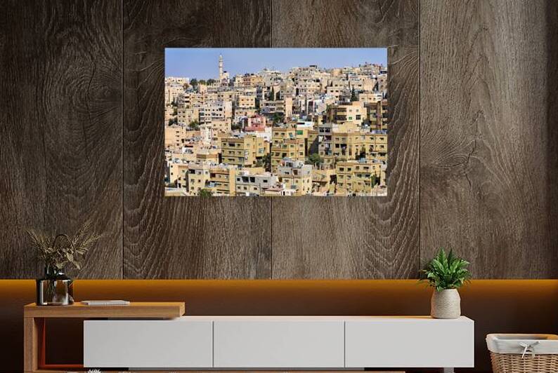 Cityscape of Amman Jordan with numerous buildings and structures by Marco Brivio