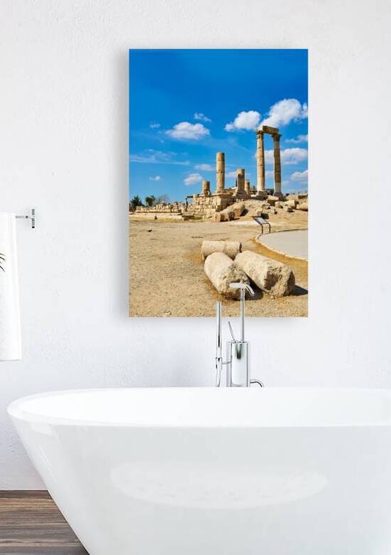 Ruins of the Citadel in Amman with pillars and cloudy sky by Marco Brivio