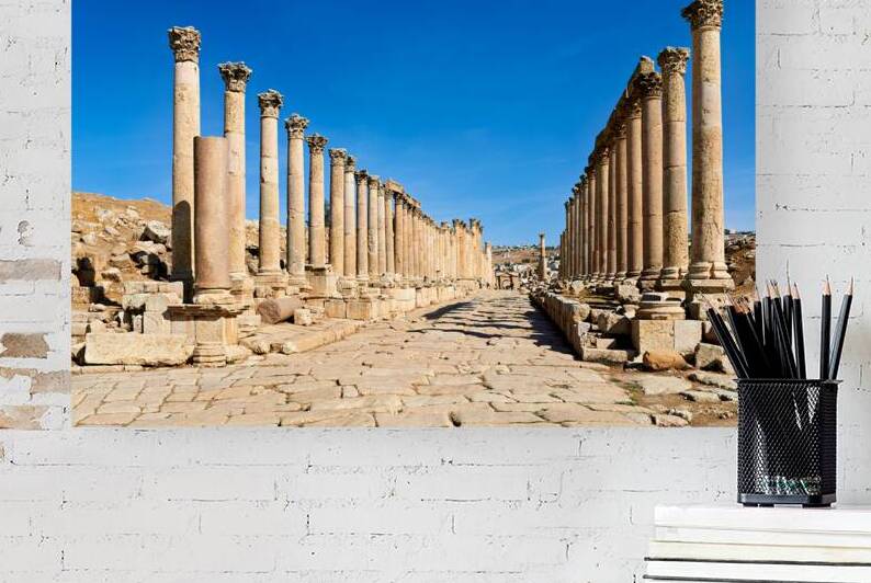 Exploring the colonnaded street in the ancient city of Gerasa by Marco Brivio