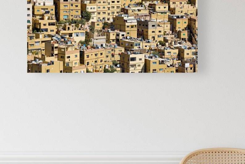 Cityscape of Amman Jordan with many yellow buildings by Marco Brivio