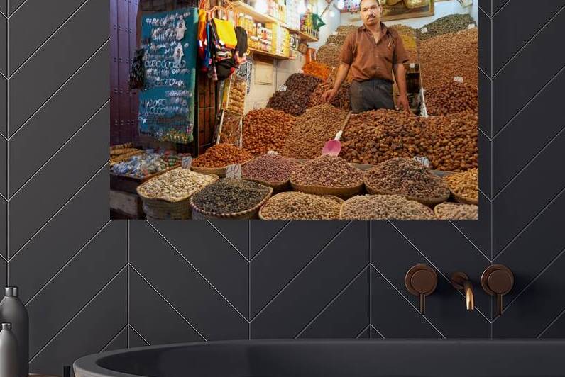 Dried fruit sale in souk of Marrakesh Morocco during daytime by Marco Brivio