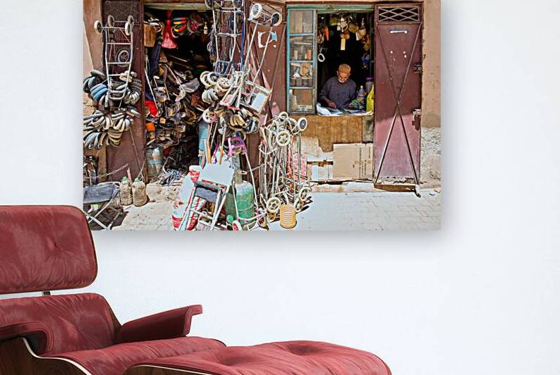 Second hand dealer working in Meknes Moroccos market street by Marco Brivio