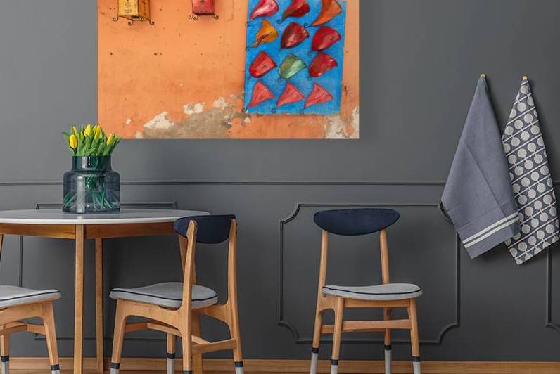 Traditional Moroccan chandeliers in Marrakesh on a vibrant wall by Marco Brivio