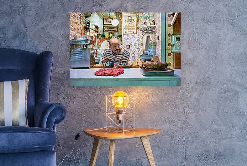 Meknes butcher in the souk selling fresh meat and sausages by Marco Brivio