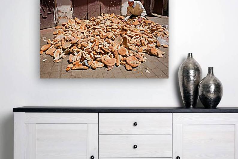 Collecting bread in Meknes Morocco during the day by Marco Brivio