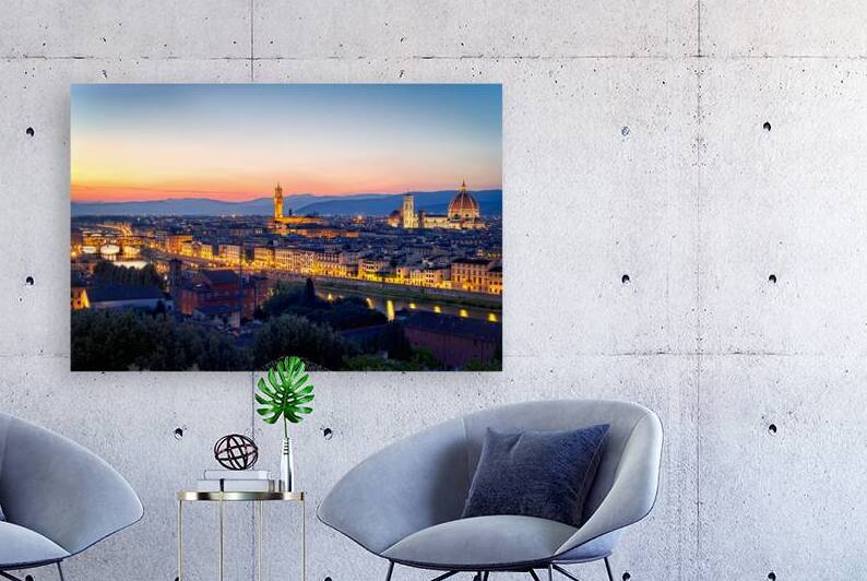 High view of Florence at dusk with city lights and landmarks by Marco Brivio