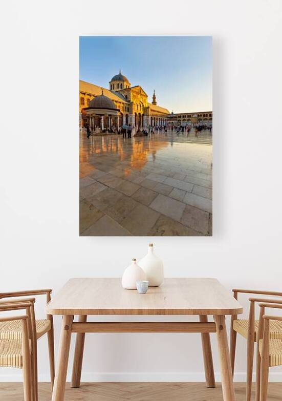 Visitors gather at the Umayyad Mosque in Damascus during sunset by Marco Brivio