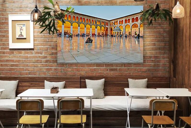 Visitors gather in the courtyard of Umayyad Mosque in Damascus by Marco Brivio