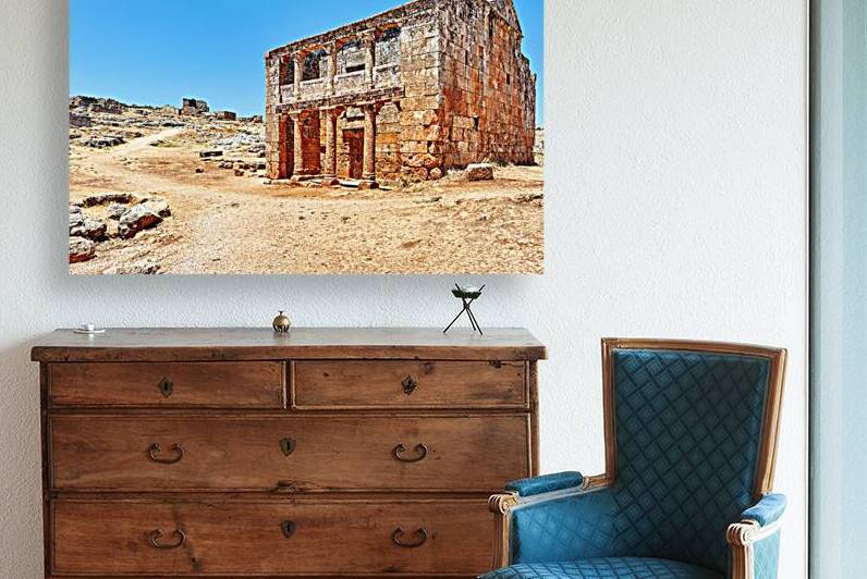 Exploring historic ruins in Serjilla Syria on a clear day by Marco Brivio