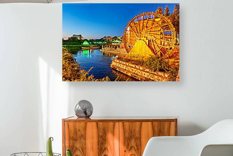 Water wheels in Hama Syria by the Orontes River at dusk by Marco Brivio