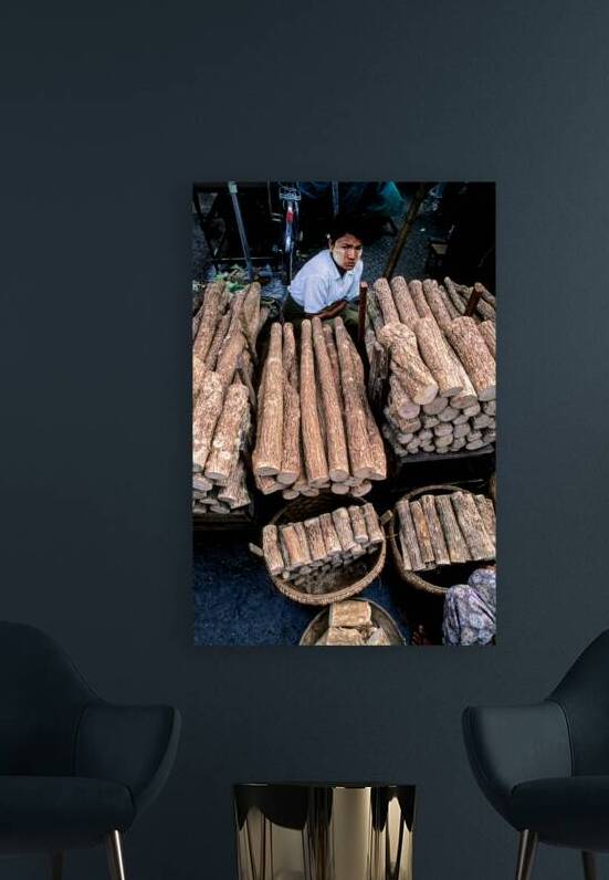Market activity in Yangon featuring wood seller and products by Marco Brivio