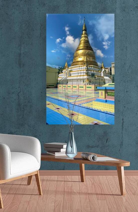 Golden stupa at Sagaing Paya in Myanmar under blue sky by Marco Brivio