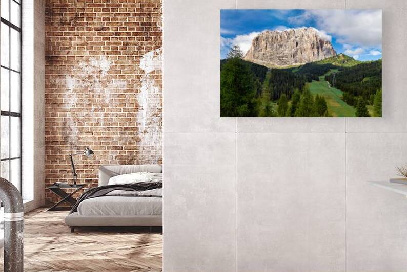 Sassolungo mountain in Val Gardena Italy during daytime by Marco Brivio