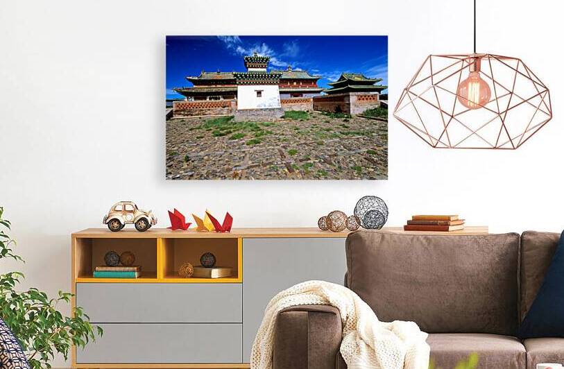 Erdene Zuu Monastery stands in Mongolia under a blue sky by Marco Brivio