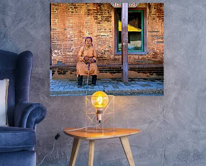 Old woman sits at Gandantegchinlen Monastery in Ulaanbaatar Mon by Marco Brivio