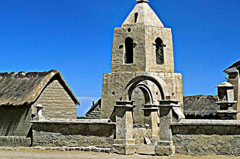 Historic adobe church bell tower in Sajama village Bolivia by Marco Brivio