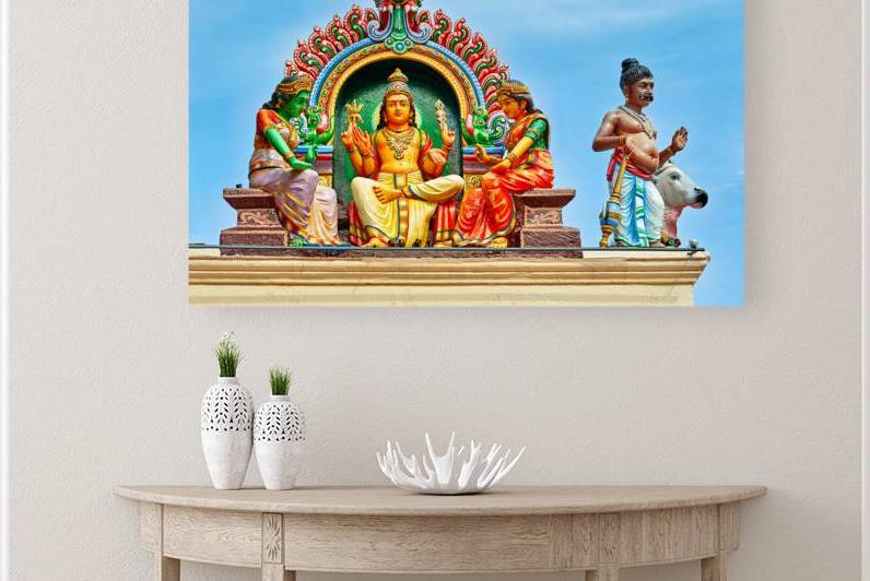 Visitors admire sculptures at Sri Mariamman Temple in Singapore by Marco Brivio