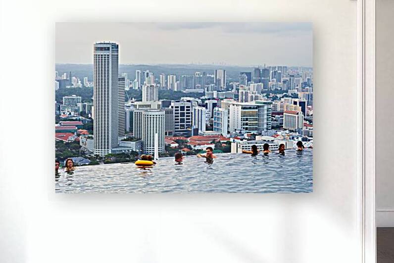Visitors enjoy the Infinity Pool at Marina Bay Sands by Marco Brivio