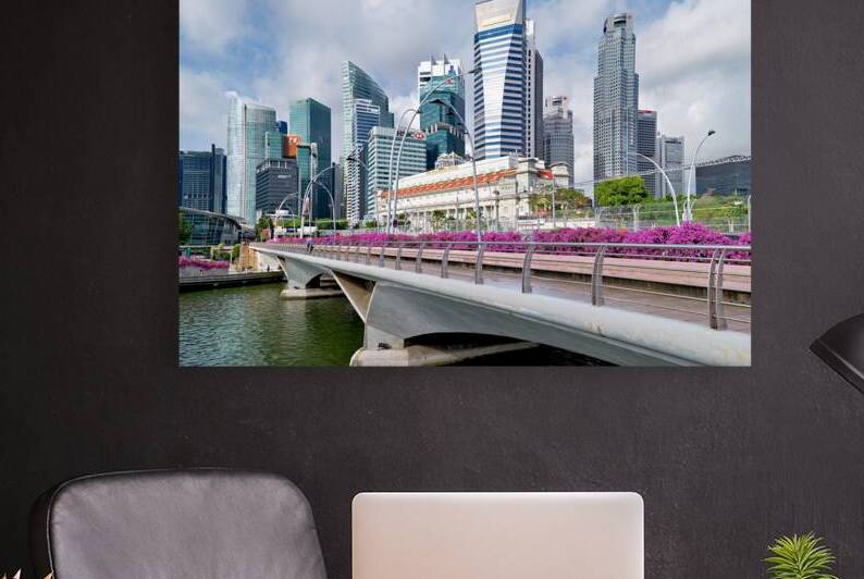 People are walking by a bridge in Singapores financial area by Marco Brivio