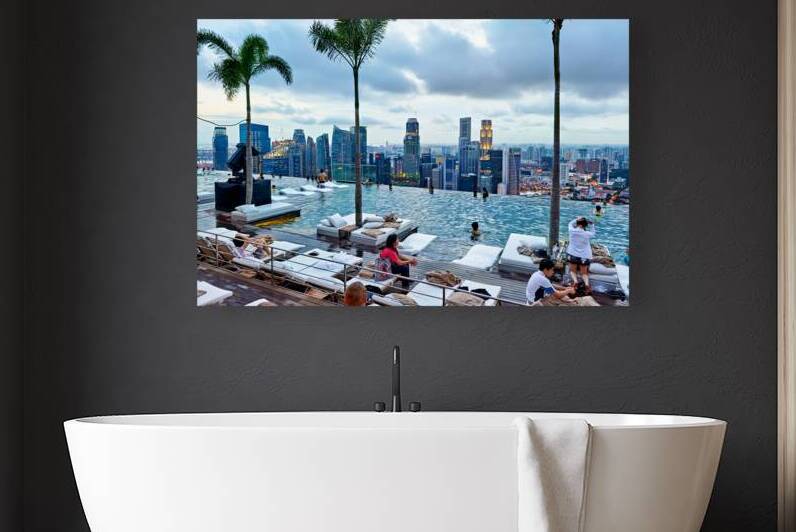 Visitors relax and swim in Marina Bay Sands Infinity Pool by Marco Brivio