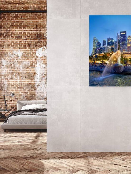 Visitors watch Merlion fountain at Marina Bay with Sands Hotel b by Marco Brivio