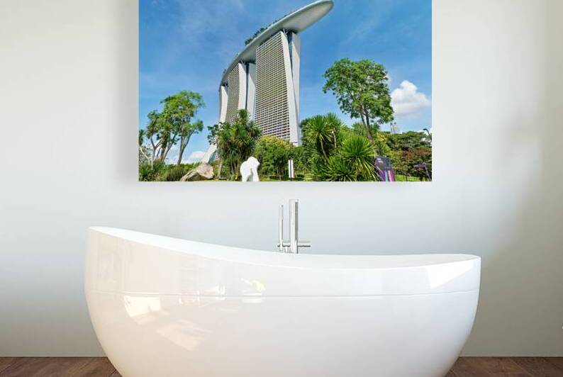 Marina Bay Sands Hotel stands tall in Singapore with clear blue  by Marco Brivio